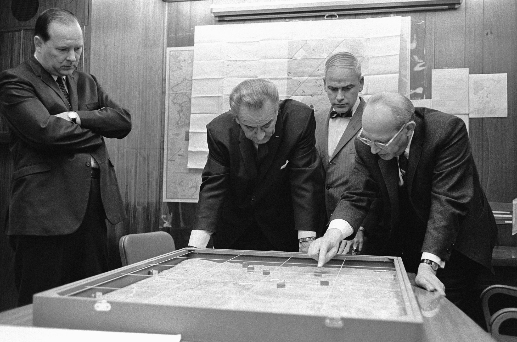 Walt Rostow, Johnson's national security advisor, meeting with Johnson in the Situation Room where the two reviewed a map of the region where the Battle of Khe Sanh was being waged 